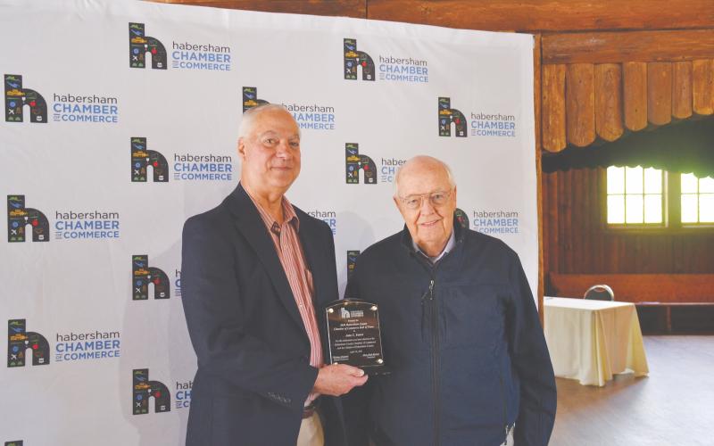 Habersham County Chamber of Commerce Hall of Fame inductee John Foster (right) is presented his award by Joey Duncan.