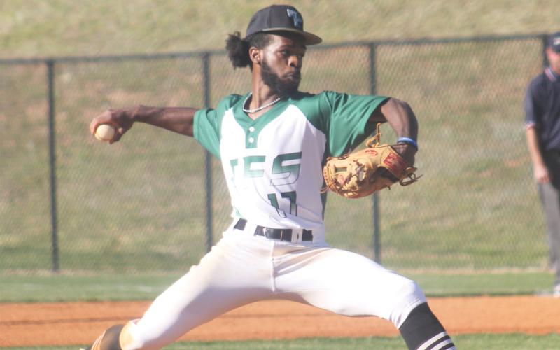 Trent Thomas fires a pitch during Thursday’s matchup with Athens Academy. The Indians won the game 12-2 behind Thomas’ dominant pitching performance.