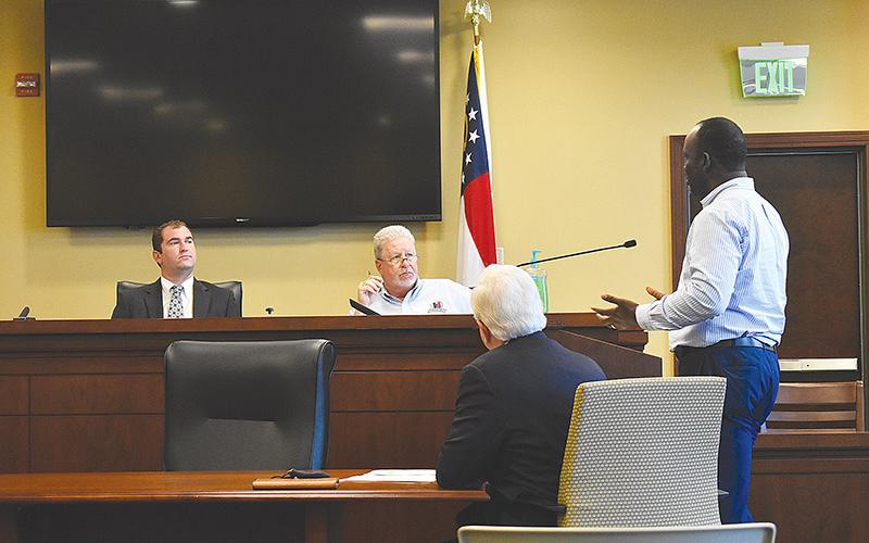 On Monday, Michael Baker International Project Manager Charles Adeogon, far right, discussed with the Habersham  Airport Commission how the price of steel is affecting its T-Hangar project. Airport commissioner Christopher Limbach, chairman Ken Schubring and County Manager Phil Sutton listen in.