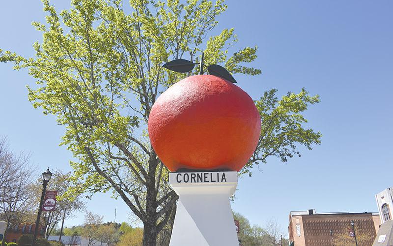 The Big Red Apple monument in Cornelia with its fresh coat of paint on Friday.