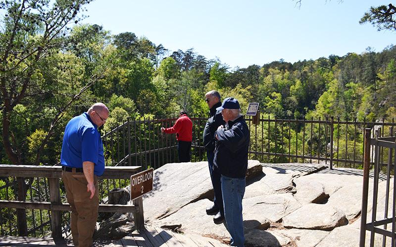 First responders check the scene of a woman's death near Outlook 2 in Tallulah Gorge State Park on Thursday afternoon. BRIAN WELLMEIER/Staff