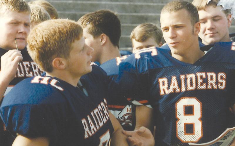 Habersham Central wide receiver Lance Black (8) chats it up with teammate Jake York back in their playing days in the mid 1990s.