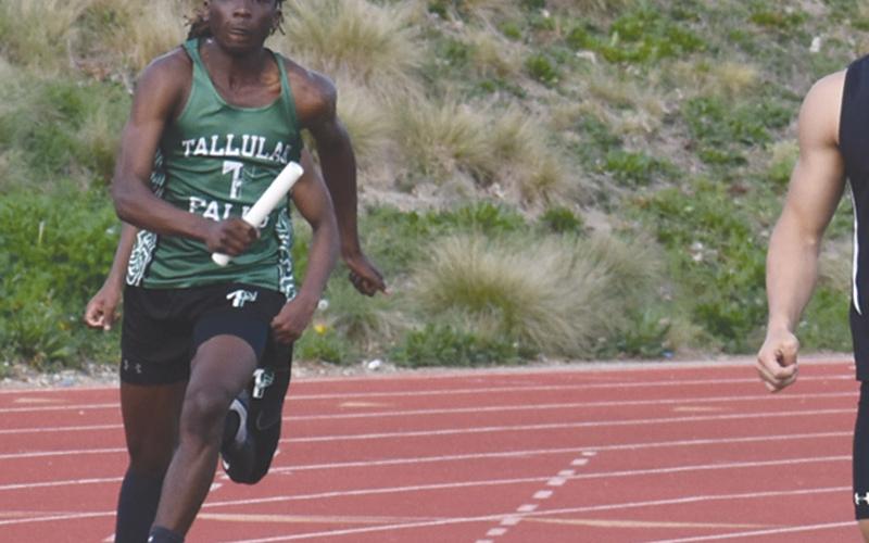 Tallulah Falls’ Simeon Respress runs a relay at the Battle of Blue Ridge last month. Respress also took second in the long jump at the Georgia Spring Break Showdown. ISAIAH SMITH/Staff