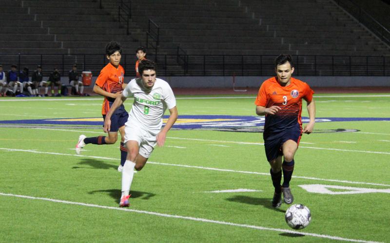 Habersham Central’s Angel Zavala gets past a Buford defender during an earlier home game. ISAIAH SMITH/Staff