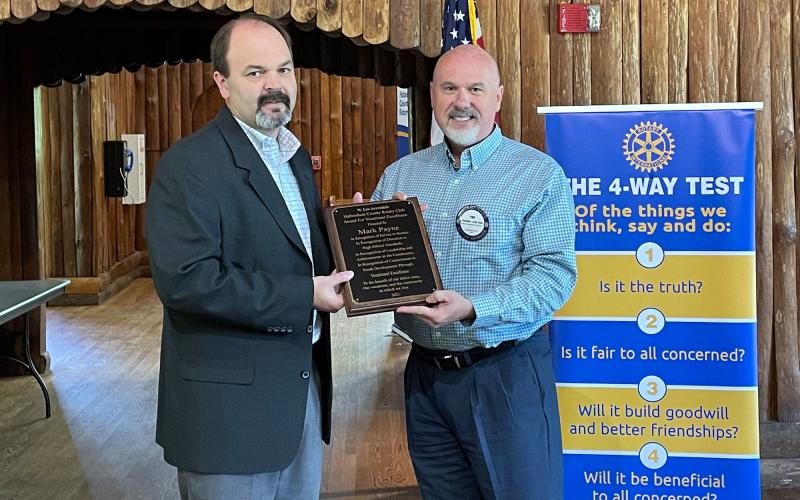 Tim Ash presents Mark Payne with the Lee Arrendale Award. BRIAN WELLMEIER/Staff