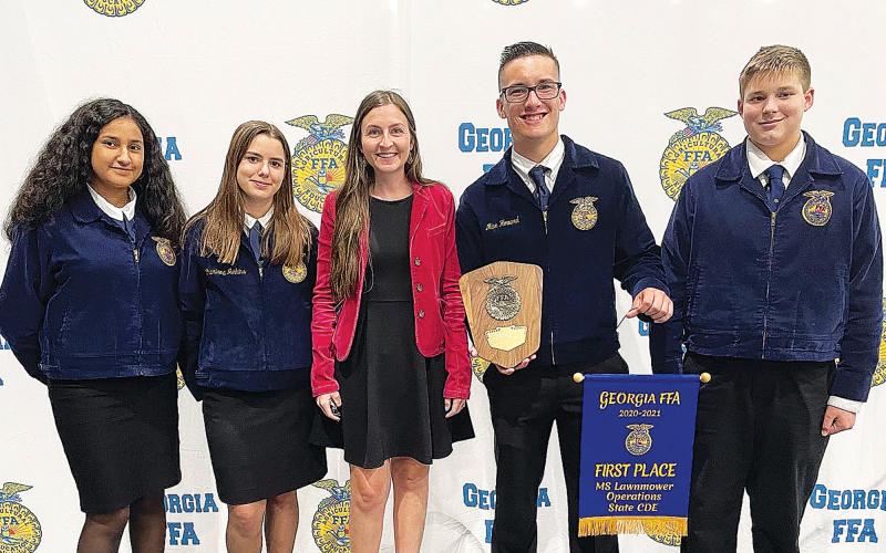 FFA participants from Hilliard A. Wilbanks Middle School included (from left) Mia Rios, Charisma Jenkins, Advisor Leigh Vinson, Max Howard (Lawnmower Operations State Champion and Gold Middle School SAE) and Devin Redding (Record Book in Power Structure and Technical Systems). LEIGH VINSON/Submitted