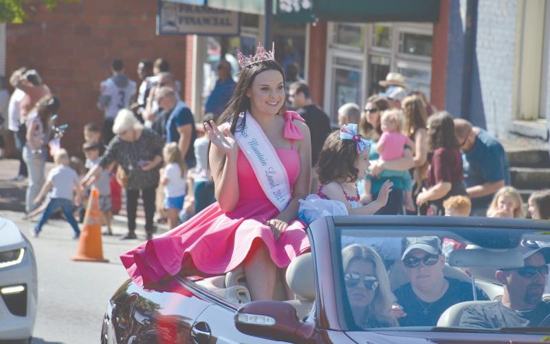 Miss Mountain Laurel 2021 Zori Hewell waves to the crowd during the parade May 15. MATTHEW OSBORNE/Staff