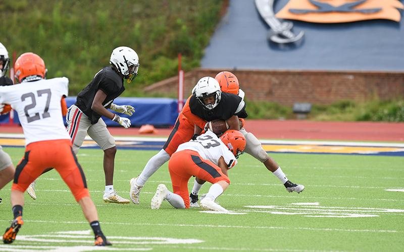 The Raiders worked on solid tackling during the scrimmage.