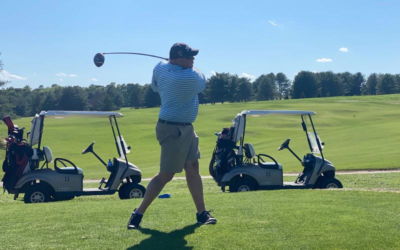 Chip Brooks watches a shot off the tee on No. 4 at Apple Mountain on Friday. ISAIAH SMITH/Staff