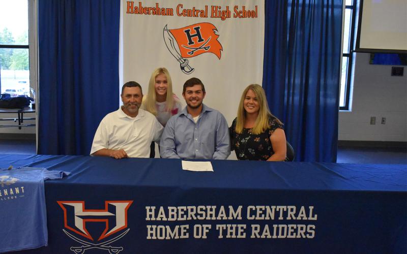 Logan Hare also signed with Toccoa Falls College. Joining him was his father Wyman Hare (left), mother Lori Hare (right) and sister Emma Hare (back).