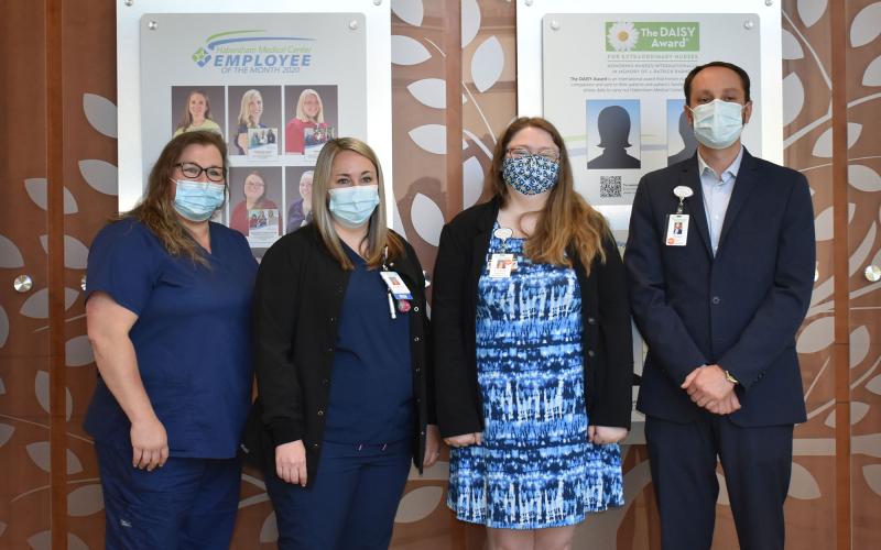 From left, ACS Educator Crystal Corbin, Registered Nurse Pamela Tench and Medical Records Supervisor Cassie Smith are among the 2020 Employees of the Month recognized on the new Employee Appreciation Wall at Habersham Medical Center. CEO Tyler Williams thanks them for their hard work. CHAMIAN CRUZ/Staff