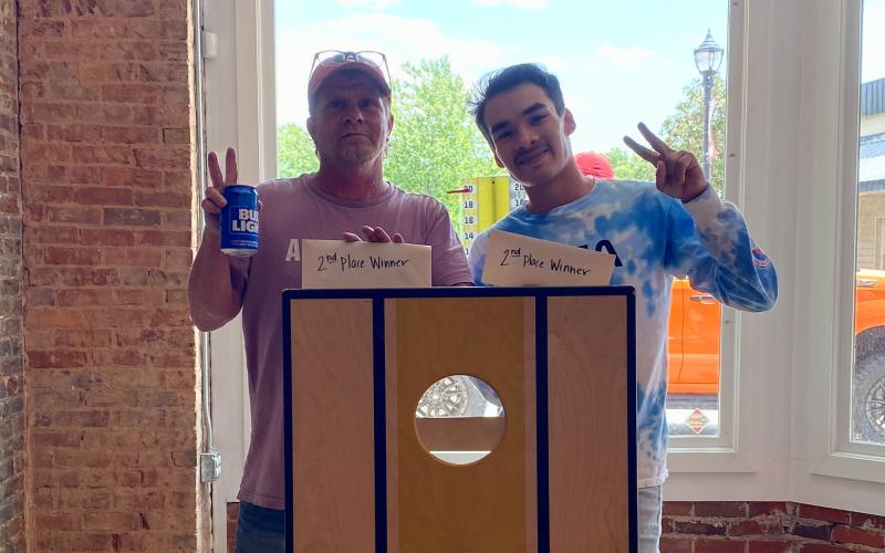 Tracy Harris (left) and Xavier Locuse were runners up in the tournament and received two $50 Visa Gift Cards and a pair of $25 Bigg Daddys gift cards. LINDSEY FITZGERALD/Submitted