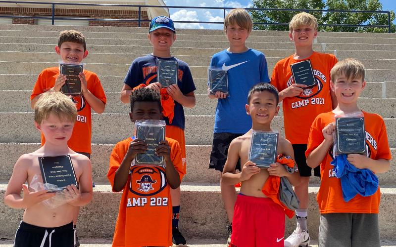 The Future Raiders Football Camp concluded Wednesday afternoon with several participants taking awards for their performances in the punt, pass and kick competition in their age groups. Award winners were (front from left) Alexander Owen, Monterrio Johnson Jr., Landon Nifong, Zachary Jones, (back from left) Owen Almazan, Crede Jones, Jackson McNeil and Sutton Porter. ISAIAH SMITH/Staff
