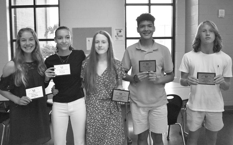 Habersham County middle school track award winners were (from left) Audrey Hotard (best female distance runner), Reese Scott (best female sprinter), Sophia Blackburn (best female hurdler), Trey King (coaches award) and Creighton Bennett (best male hurdler). ISAIAH SMITH/Staff