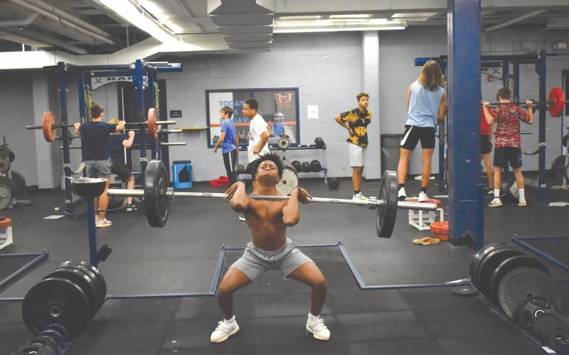 Cameron Young completes a power clean rep. ISAIAH SMITH/Staff