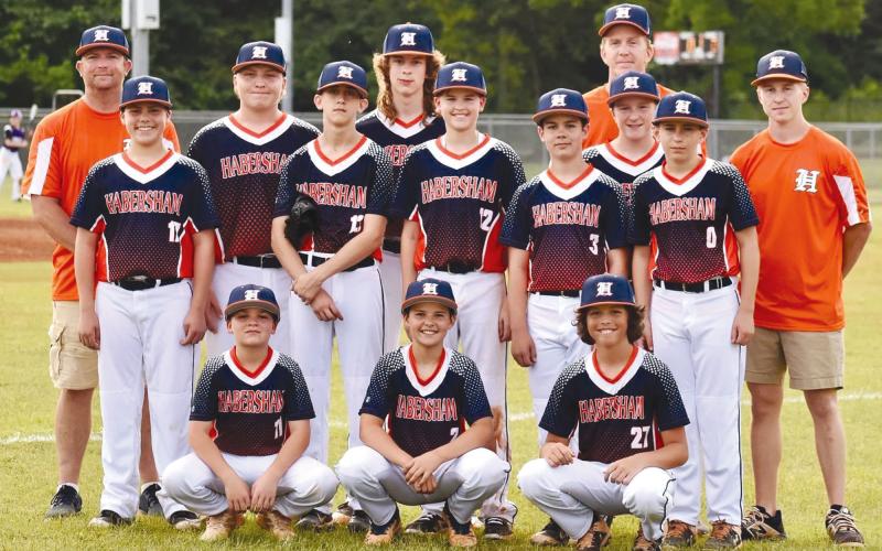 Team members were (front L-R) Malachi Wilkerson, Andrew York, Kaden Dobbs, (middle) Jack Attard, Tripp Joslyn, Wyatt Wilcox, Parker Homa, Luke Moore, (back) coach Brent Dobbs, Braiden Knight, Zach Freeman, Preston Erwin, coach Richard Erwin and coach Andrew Erwin.
