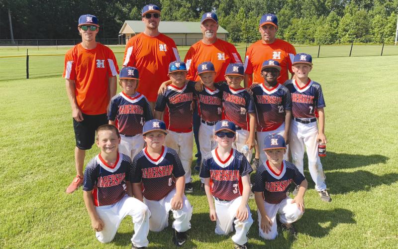 Team members were (front from left) Jacob Wilkinson, Christian Justice, Sebastian Stephens, Brock Wall, (middle) Luke Tatum, Sawyer Waddell, Branson Stephens, Noah Whitlow, Kobe Goss, Harlan Wilbanks, (back) coaches Trent Wal, Jon Wilbanks, James Whitlow and Nelson Wilkinson.