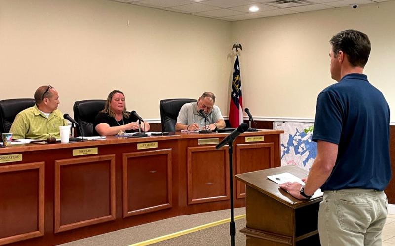 Developer Carl Volle takes questions from Baldwin City Council on Monday night. BRIAN WELLMEIER/Staff