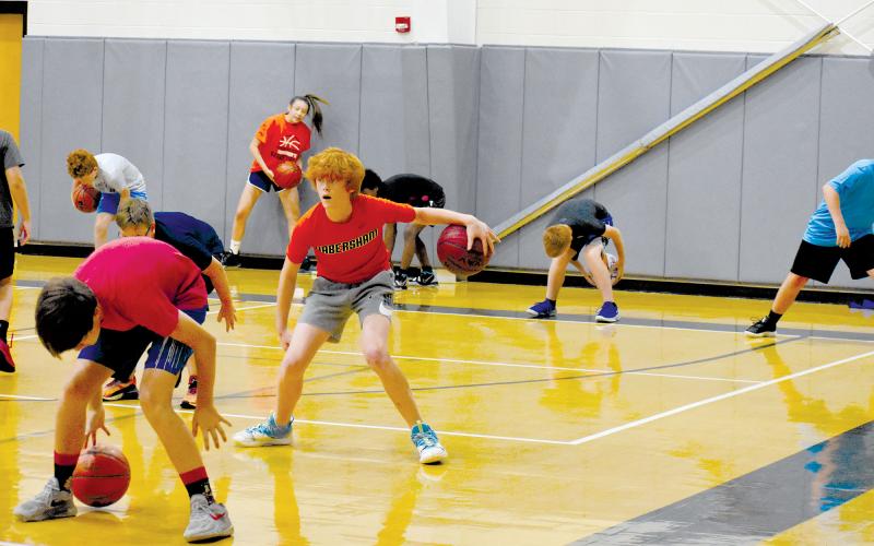 Devin Lance works on his handles at MAJ Hoops Championship Skills Basketball Camp. ISAIAH SMITH/Staff