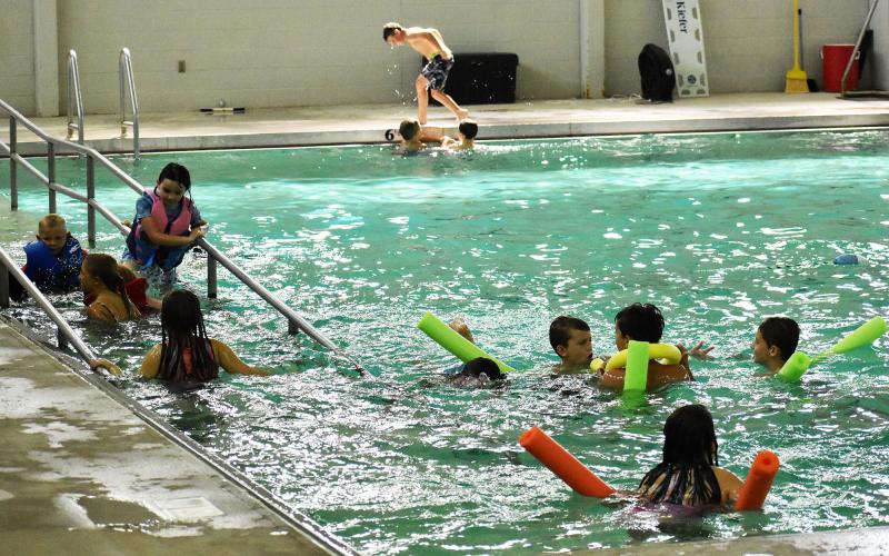 Campers enjoy a day in the pool Tuesday at the Ruby Fulbright Aquatic Center. ISAIAH SMITH/Staff
