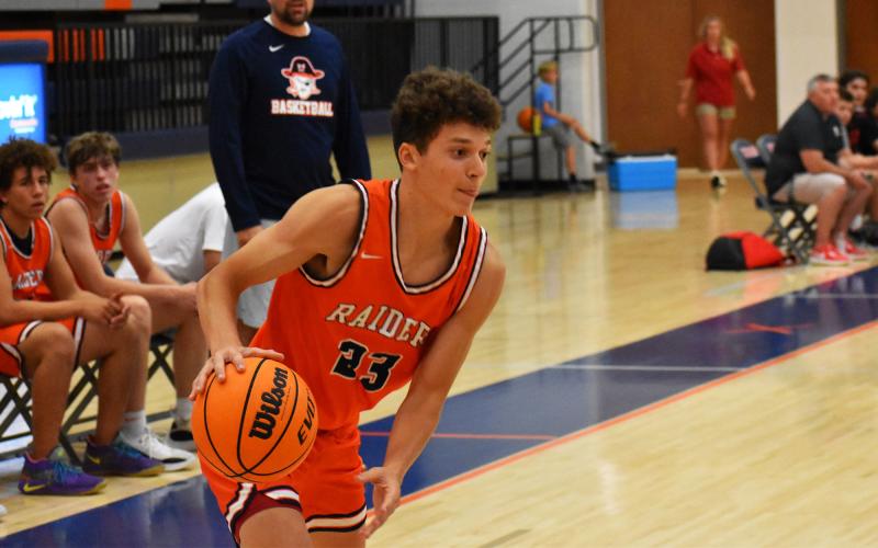 Kaden Hooks looks to get to the rack. ISAIAH SMITH/Staff