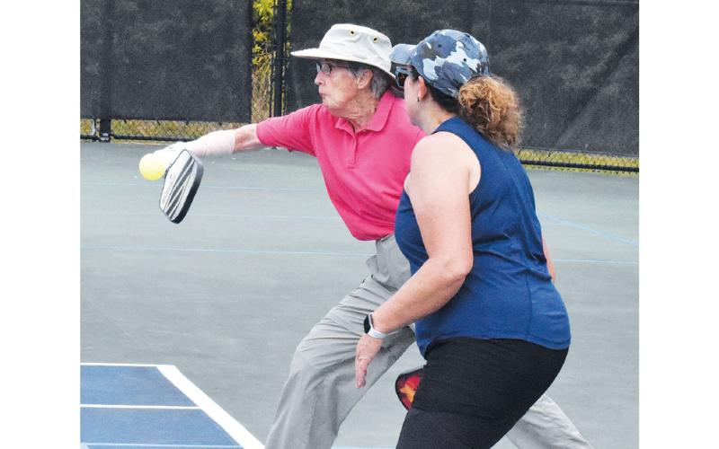 Sarah Shearouse returns the ball to her opponent. Pickleball is one the nation’s fastest-growing sports. ISAIAH SMITH/Staff