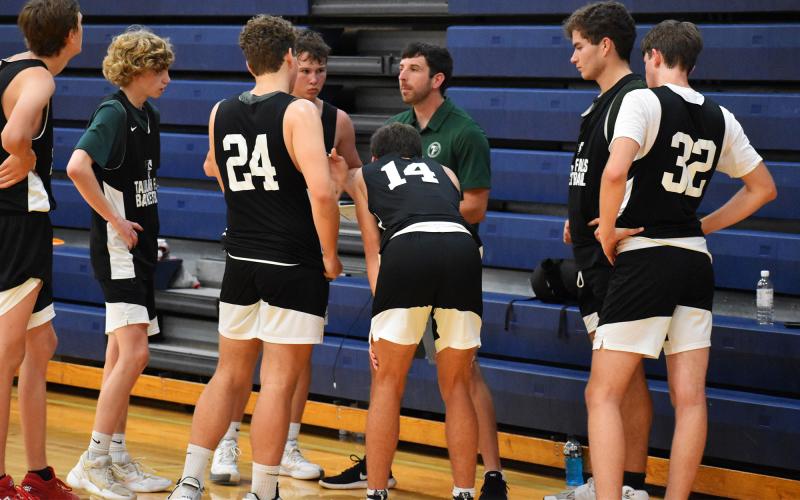 Tallulah Falls head coach Cody Coleman looks to rally his team during a timeout last week. ISAIAH SMITH/Staff