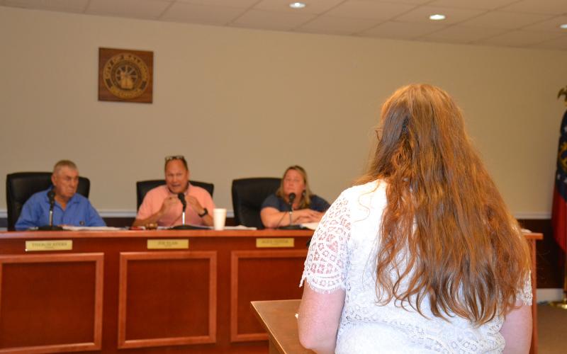 City Clerk Emily Woodmaster presents council members with 2022 budget. BRIAN WELLMEIER/Staff
