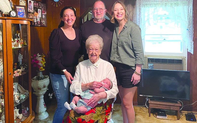 Joyce Jordan sits with new great great granddaughter Johana Lynch, surrounded by  granddaughter Misty Baird (left), son Dennis Jordan and great granddaughter Shelby Lynch.