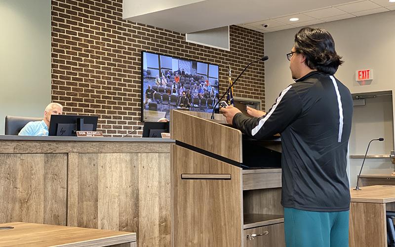 Cornelia resident Roy Alvarez speaks to the Cornelia City Commission in opposition to the proposed ordinance change that would have limited large gatherings in residential areas, saying it’s important that his family is able to occasionally get together, especially after a long week of work.