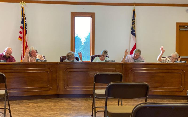 Among other things, Town of Alto Council Members, left to right, Allen Fox, PJ Huggins, Carolyn Cabe, Mayor Audrey Turner, Eddie Palmer and James Turner unanimously agree to include a resolution for the packaged sale of distilled spirits on the November ballot. CHAMIAN CRUZ/Staff