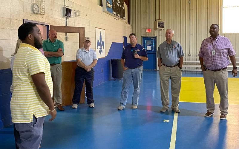 Qymane Brawner (left) and Steven Mickens (far right) address Habersham County school officials, including (from left) Superintendent Matthew Cooper and Board of Education members Robert Barron, Chairman Russ Nelson and Joey Duncan. BRIAN WELLMEIER/Staff