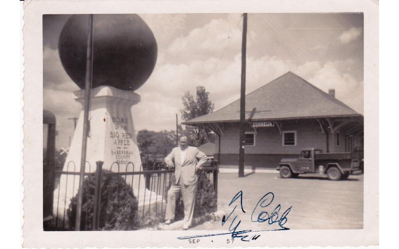 Ty Cobb takes a moment for a picture with Cornelia’s Big Red Apple in 1957 before later signing it. MYRTILE WOOD SMITH/Submitted