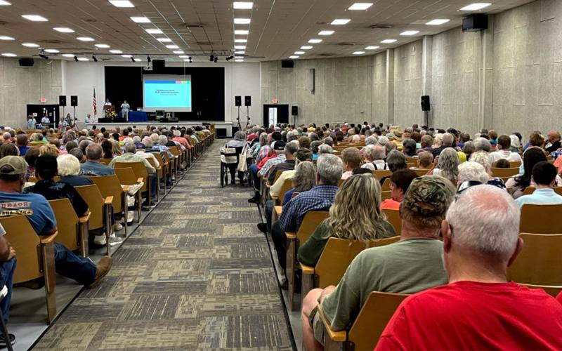 The audience fills the Ninth Grade Academy for the Habersham EMC business meeting on Thursday night. BRIAN WELLMEIER/Staff