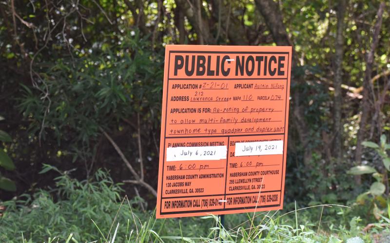 Signs like these are put up when a public hearing is scheduled about a potential zoning change. MATTHEW OSBORNE/Staff