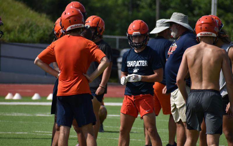 Raider players get ready to line up in punt formation as they listen to instructions. Raider players get ready to line up in punt formation as they listen to instructions. MATTHEW OSBORNE/Staff