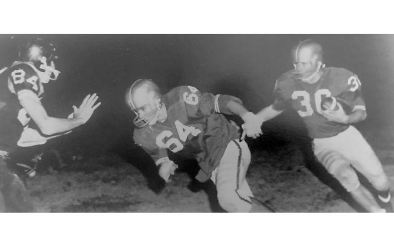 Dexter Pratchard leads the way for Robin Lokey during a South  Habersham game in 1963.