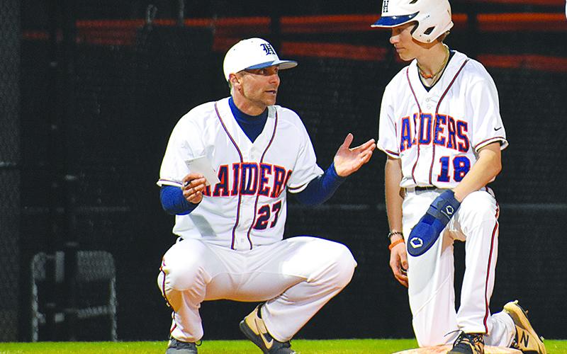 Habersham Central baseball coach Chris Akridge talks to  Kaleb Chastain during an opponent’s mound visit last season. CODY ROGERS/Staff