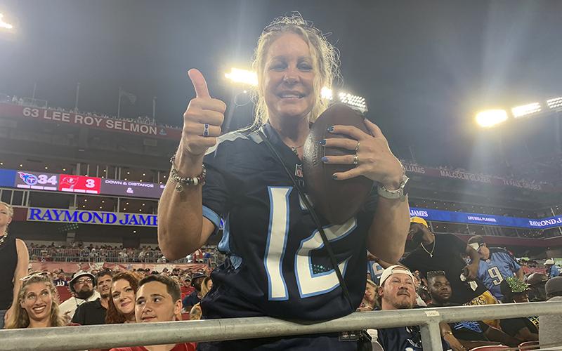 Janet Kinsey got a special treat from her son at the Tampa Bay game – the ball from his first professional touchdown. Photo by CORY CURTIS/Special