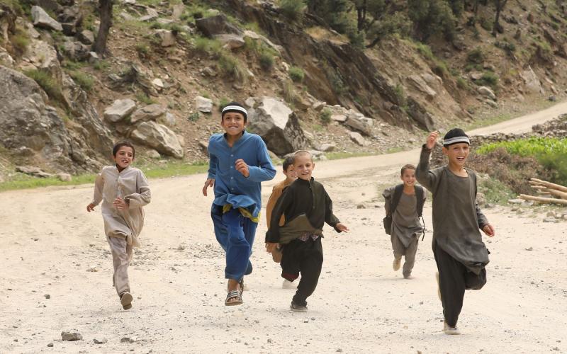 Afghan children run and play in quieter times for their embattled nation. SOHAIB GHYASI/Unsplash
