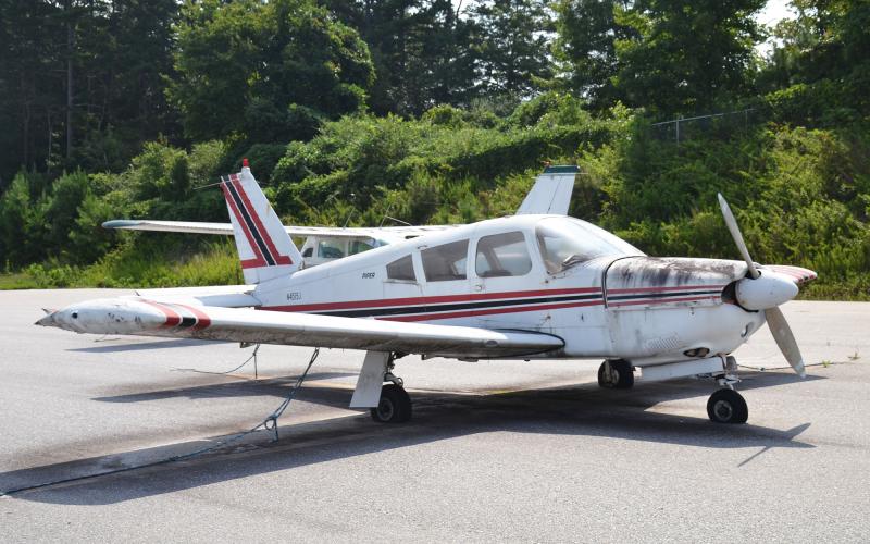 Shown is one of two abandoned airplanes have been sitting at the Habersham County Airport for nearly a decade. BRIAN WELLMEIER/Staff
