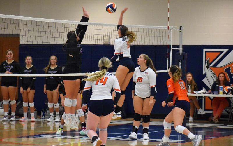 Allie Church goes for a spike at the net against Lumpkin County. CODY ROGERS/Staff