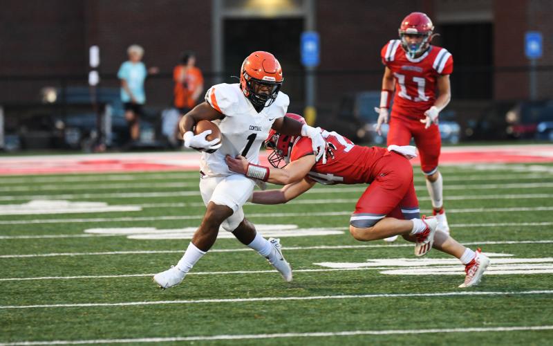 Habersham Central’s Simarcus Burney sheds a tackler during last week’s opener against Madison County. TOM ASKEW/Special