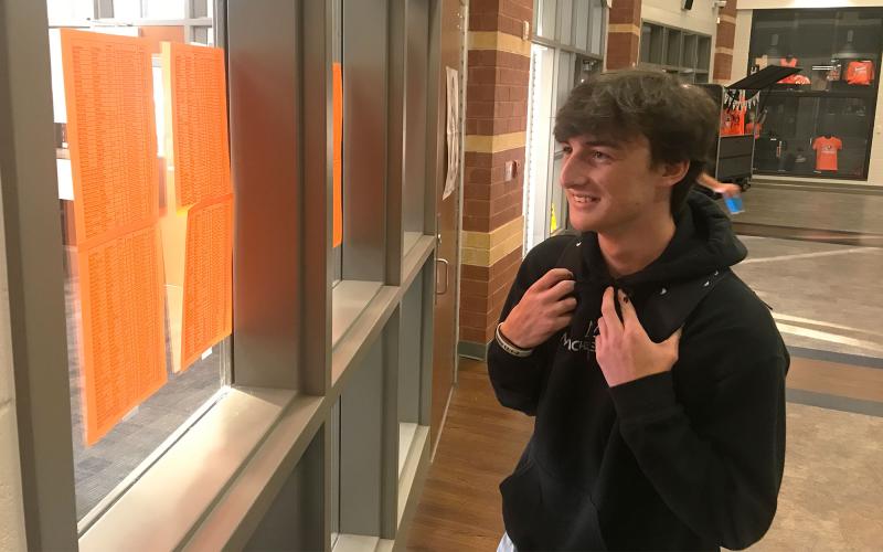 Habersham Central  student  Preston Berkshire looks for his homeroom assignment on the first day of school. MATTHEW  OSBORNE/Staff