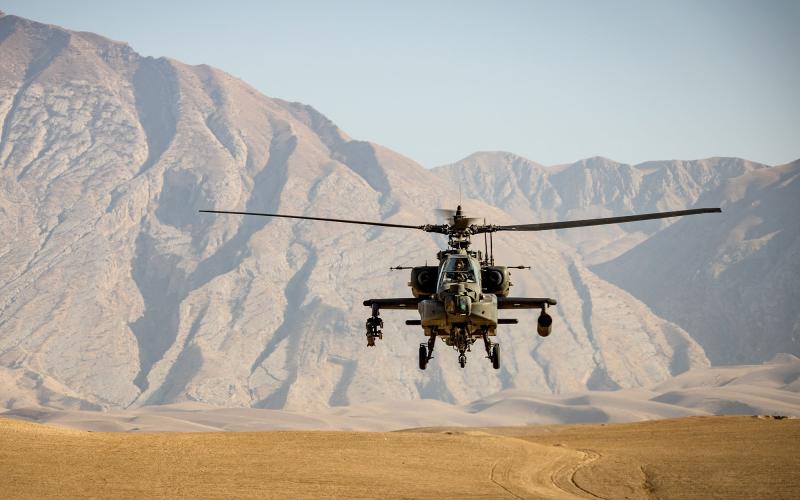 An American Apache helicopter flies through Afghanistan earlier this year. ANDRE KLIMKE/Unsplash