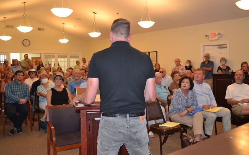 Lew Oliver presents his master plan to a room packed with Clarkesville residents on July 29. BRIAN WELLMEIER/Staff