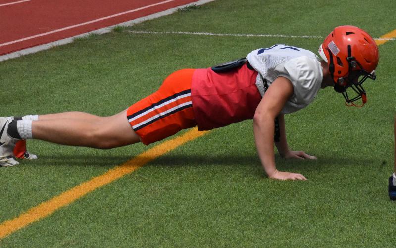 Sometimes extra calisthenics are needed after a dropped pass. MATTHEW OSBORNE/Staff