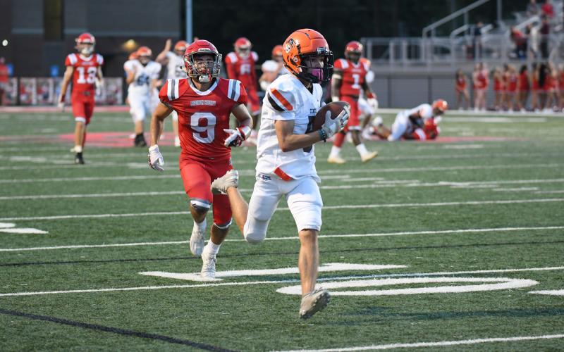Habersham Central freshman Zeke Whittington gets behind the defense for a touchdown against Madison County on Friday night. TOM ASKEW/Special