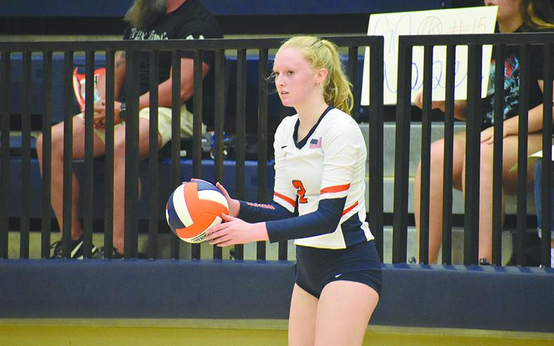 Molly Butler – shown above getting ready to serve during a recent Lady Raiders home match – set a new personal best with 11 aces in Habersham’s win over East Forsyth on Sept. 7. CODY ROGERS/Staff