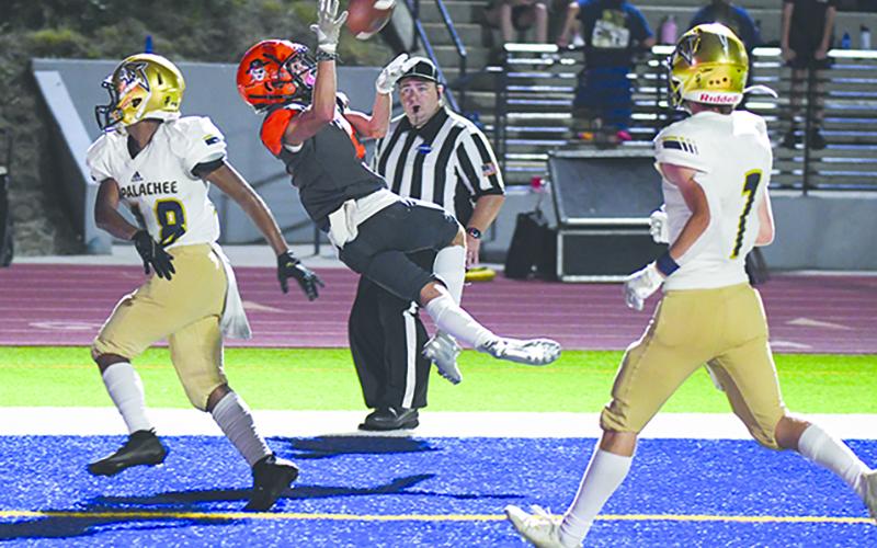 Habersham Central’s Zeke Whittington goes up for a touchdown catch during the third quarter against Apalachee on Friday night. TOM ASKEW/Special